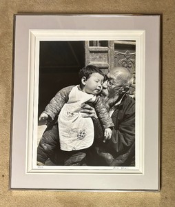 lot 541 image: Dmitri Kessel Old Hsu, Venerated Lark Trainer and Elder of Red Pepper Village in Northeastern China with His Granddaughter