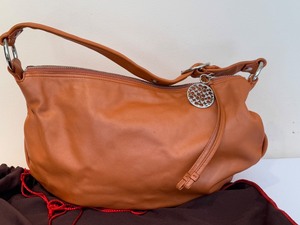 lot 391 image: Coach Orange Leather Slouch Tote Bag