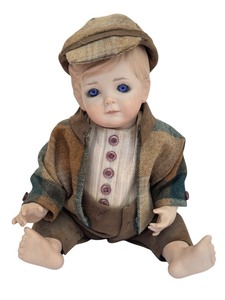 lot 385 image: Adorable Boy Doll with Blue Eyes
