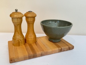 lot 381 image: Wooden Cutting Board, Salt and Pepper Mills and Artisan Crafted Pottery Bowl
