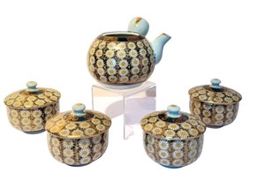 lot 157 image: Vintage Japanese Sake Set  Vintage Japanese Kutari Ware Sake Set