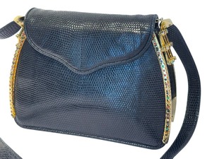 lot 54 image: Vintage Judith Leiber Handbag Snakeskin Expandable with Bejeweled Trim