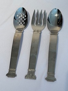 lot 556 image: Three Reed and Barton Swid Powell Serving Utensils