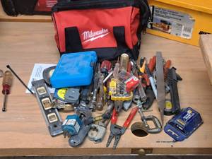 lot 91 image: Milwaukee 10 Tool Bag (New) with Assorted Hand Tools - Tapcon Condrive 500 Installation Tool, Measure Tapes, Pliers, Wire Cutter, Screwdrivers, Wrenches, Driver Bits, Levels, Razor Blades and more