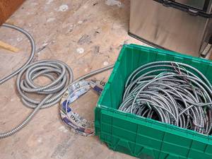 lot 100 image: Lot of  Assorted Electrical Conduit with Plastic Tote Bin