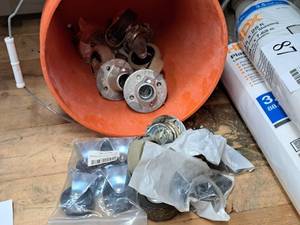 lot 117 image: Lot of (1 Bucket) Assorted Caster Wheels (some in original packaging)