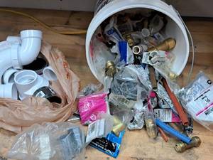 lot 118 image: Lot of (1 Bucket) Assorted Plumbing Fittings, Clamps, Pipes and Connectors, BrassPVC