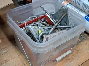 lot 121 image: Lot of (1 Bucket) Assorted Hardware - Eye Bolt, Brackets, Nails, Screws, Bolts, Washers, Nuts