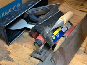 lot 123 image: Lot of (10) Assorted MasonryDrywall Hand Tools - Mud Tray, Trowels, Sanders, Scrapers