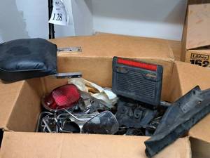 lot 147 image: Lot of (1 Box) Harley-Davidson Motorcycle Parts - Seats, Lights, Mirrors, and more