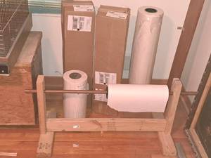 lot 177 image: Custom Kraft Paper Dispenser with 15W Roll of Paper, (1) 15W Roll of Paper (new) and (3) Rolls of 30W Paper (new)