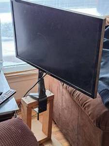 lot 194 image: Samsung 28 Flat Screen TV LU26E800DSXA with TV Wall MountSwingSwivel and Custom Wooden TV Base Stand