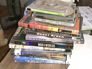 lot 201 image: Assorted DVDs, Computer Games - Matrix, Great Games For Windows, War of the Worlds, The Day After Tomorrow, Serenity, Ghost Rider