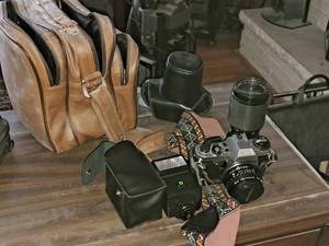 lot 205 image: Vintage Pentax Super Program 35mm Camera with Camera Bag and Accessories - Camera Case, Flash Unit with Case, Rokinon 14.5 80-200mm Zoom Lens