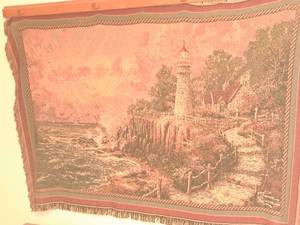 lot 221 image: Tapestry Wall Art - Lighthouse by Thomas Kinkade