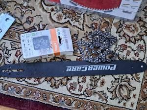 lot 265 image: Chain Saw Parts - Stihl Saw Chain 20 (in box), Saw Chain and PowerCare Chain Saw Bar 16