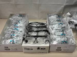 lot 49 image: NEW Mixed Brand Lot Of 24 ANSI Pyramex SOLO and Lot Of 4 MCR Clear Lens Safety Glasses