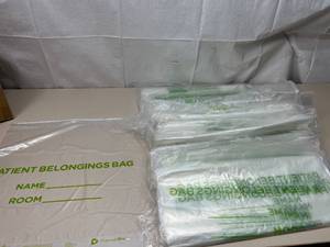 lot 55 image: Lot of 8 Packages (25 bags per package) NEW PremierPro 6716 Clear Patient Belongings Bags 18x20 with Drawstring Closure 
