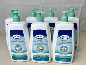 lot 102 image: MSRP $100  Lot Of 7 Bottles NEW Tena 33.8 fl. oz. PROSkin Body Wash & Shampoo