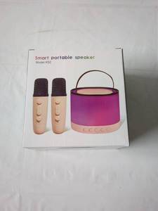 lot 57 image: Smart Portable Speaker with Dual Microphones - Model K52