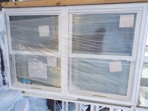 lot 43 image: Vinyl Window 35 x 54 pair of double hung together