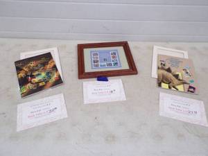 lot 11 image: 1991 and 1989 Commemorative Stamp Collection And Framed To Form a more Perfect Union