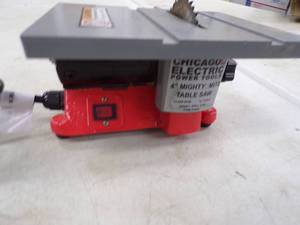 lot 55 image: 4 Mighty Mite Table Saw