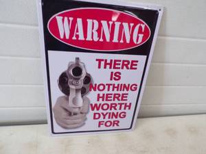 lot 104 image: Warning There is nothing here worth dying for Metal Sign