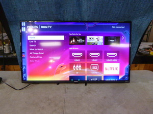 lot 40 image: Philips 42 Roku TV with Wall Mount