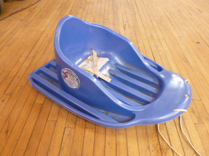 lot 135 image: Infant Boggan Toddler Plastic Pull Sled