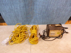 lot 157 image: Battery Charger and Extension Cords