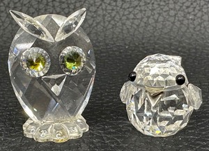 lot 28 image: Vintage Swarovski Crystal Bird Figurine with Citrine Green Eyes and Crystal Owl Figurine with Silver Beak