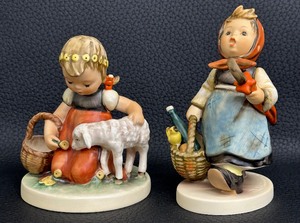 lot 228 image: Pair Hummel Figurines including Favorite Pet (1950) and Visiting - Girl with Basket (1971)