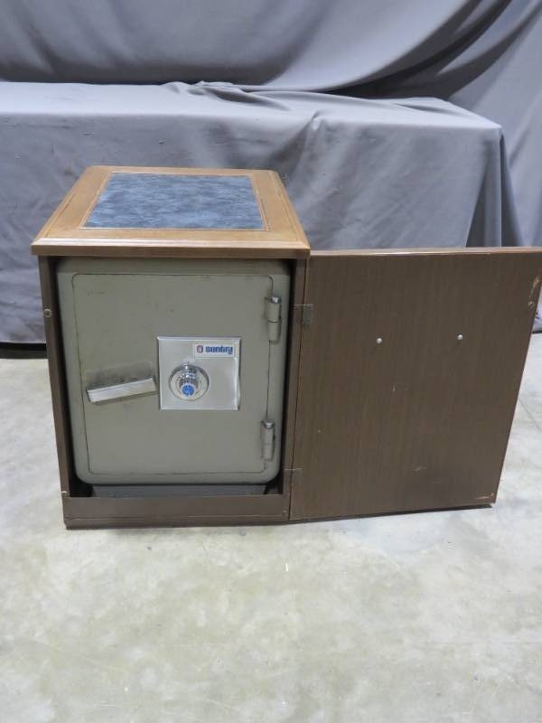 lot 49 image: Sentry Fire Resistant Safe with Concealing Safe Cabinet