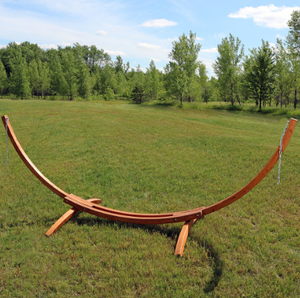 lot 23 image: Sunnydaze Curved Wooden Arc Hammock Stand with Hooks and Chains - 12 Ft