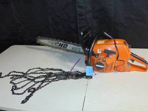 lot 20 image: ECHO, Gas-Powered  Model# CS-590-20 and Chains