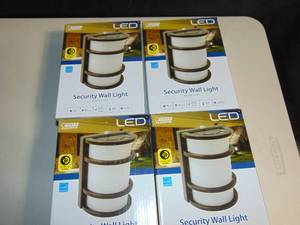 lot 88 image: 4 Pack Feit Electric - Dusk to Dawn LED Bronze Security Outdoor