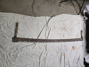 lot 14 image: Vintage Hand Saw with Wooden Handle - 56 Inch Blade