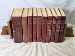 lot 51 image: Set of 10 Britannica Book of the Year (1939-1950) with Wooden Bookends