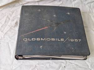 lot 63 image: Vintage 1957 Oldsmobile Sales Brochure Book
