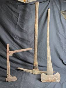 lot 178 image: Old Axe, Pick Axe and Other Tool (stuck in its position)
