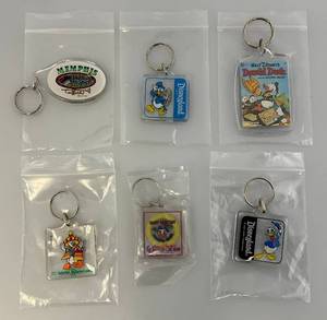 lot 189 image: Misc. Vintage Disney Collectors Key Chains Including Donald Duck And More