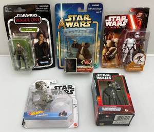lot 27 image: Misc. STAR WARS action Figures (NIB) Packaging Shows Signs Of  Wear