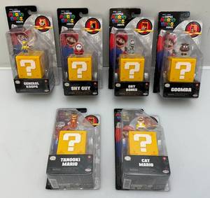 lot 55 image: Nintendo The Super Mario Bros. Movie Miniature Figures (NIB) Packaging Shows Signs Of Shelf Wear