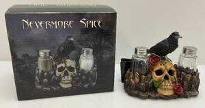 lot 58 image: DWK Home Dcor World Of Wonders Nevermore Spice Skull Salt & Pepper Set (NIB) Packaging Shows Signs Of Shelf Wear