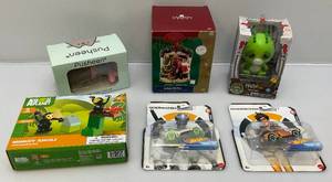 lot 95 image: Misc. Kids Toys Including Feisty Pets, Mermaid Pusheen, HotWheels & More (NIB) Packaging Shows Signs Of Shelf Wear