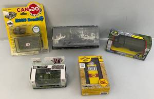 lot 104 image: Misc. Vintage Collectible Die Cast Miniature Army Vehicles (NIB) Packaging Shows Signs Of Shelf Wear