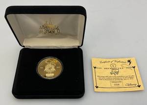 lot 121 image: Disney 50 YearMain Street USA Collectors Coin  No. 0328 With COV (NIB)