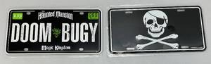 lot 122 image: Two Disney Collectible License Plates Including Haunted Mansion & Skull With Cross Bones