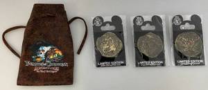 lot 131 image: Disney Limited Edition  1 Of 500 Pirates Of The Caribbean Pin Set With Pouch (NIB)